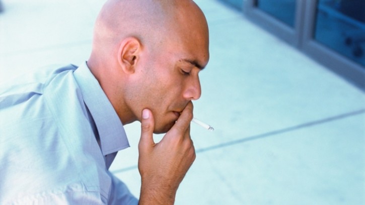 Researchers found male smokers are 1.8 times higher risk of hair loss © Getty Images